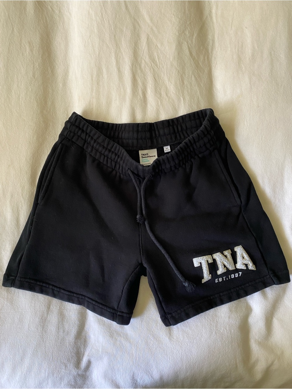 Aritzia TNA Black Shorts with White Logo